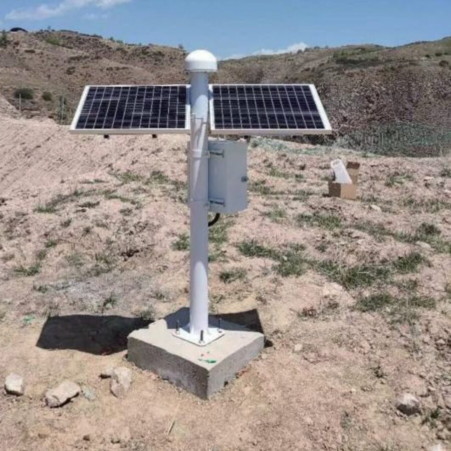 GNSS monitoring station with dome antenna and solar panels