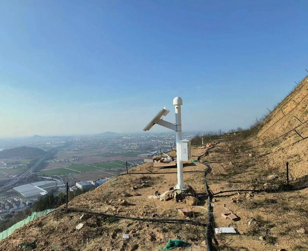 GNSS monitoring station installed on a slope